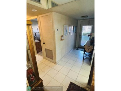 This charming two-bedroom, two-bath condo offers a cozy retreat on Sunrise Lakes Phase III in Florida - for sale on GolfHomes.com, golf home, golf lot