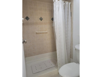 ***Lovely and Immaculate 4th floor unit with serene views of on Pine Island Ridge Country Club in Florida - for sale on GolfHomes.com, golf home, golf lot