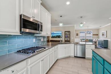 WOW! Experience coastal luxury in this 4BR, 3BA waterfront on The Palencia Club in Florida - for sale on GolfHomes.com, golf home, golf lot