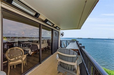 WATERFRONT LIFE AT ITS BEST! Spectacular sunsets, relaxing on The Dunedin Country Club in Florida - for sale on GolfHomes.com, golf home, golf lot