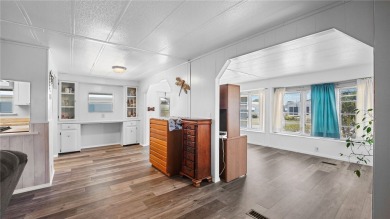 Worried about shoveling snow this winter? Florida says hello on Barefoot Bay Golf Course in Florida - for sale on GolfHomes.com, golf home, golf lot