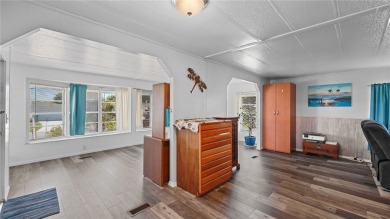 Worried about shoveling snow this winter? Florida says hello on Barefoot Bay Golf Course in Florida - for sale on GolfHomes.com, golf home, golf lot