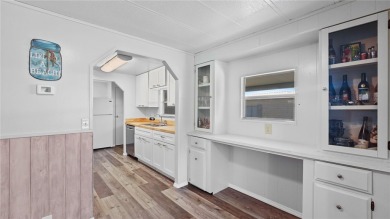 Worried about shoveling snow this winter? Florida says hello on Barefoot Bay Golf Course in Florida - for sale on GolfHomes.com, golf home, golf lot