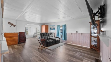 Worried about shoveling snow this winter? Florida says hello on Barefoot Bay Golf Course in Florida - for sale on GolfHomes.com, golf home, golf lot
