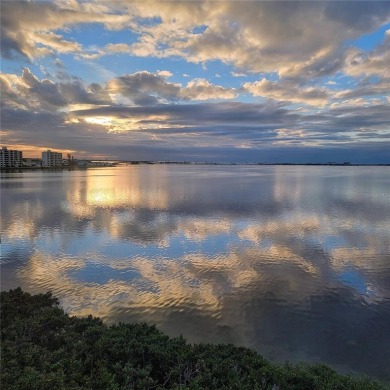 WATERFRONT LIFE AT ITS BEST! Spectacular sunsets, relaxing on The Dunedin Country Club in Florida - for sale on GolfHomes.com, golf home, golf lot