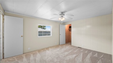 Worried about shoveling snow this winter? Florida says hello on Barefoot Bay Golf Course in Florida - for sale on GolfHomes.com, golf home, golf lot