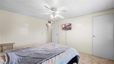 Worried about shoveling snow this winter? Florida says hello on Barefoot Bay Golf Course in Florida - for sale on GolfHomes.com, golf home, golf lot