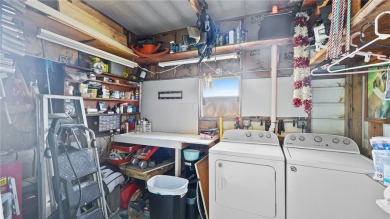 Worried about shoveling snow this winter? Florida says hello on Barefoot Bay Golf Course in Florida - for sale on GolfHomes.com, golf home, golf lot