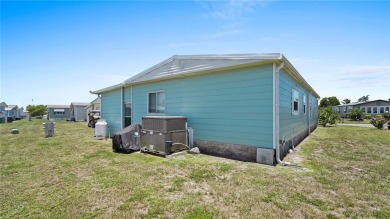 Worried about shoveling snow this winter? Florida says hello on Barefoot Bay Golf Course in Florida - for sale on GolfHomes.com, golf home, golf lot