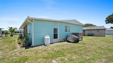 Worried about shoveling snow this winter? Florida says hello on Barefoot Bay Golf Course in Florida - for sale on GolfHomes.com, golf home, golf lot