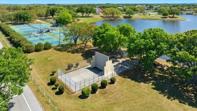 Worried about shoveling snow this winter? Florida says hello on Barefoot Bay Golf Course in Florida - for sale on GolfHomes.com, golf home, golf lot