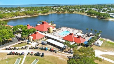 Worried about shoveling snow this winter? Florida says hello on Barefoot Bay Golf Course in Florida - for sale on GolfHomes.com, golf home, golf lot
