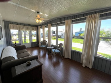 Welcome to your dream oasis! This stunning 2-bedroom, 2-bathroom on Lake Henry Golf Club in Florida - for sale on GolfHomes.com, golf home, golf lot