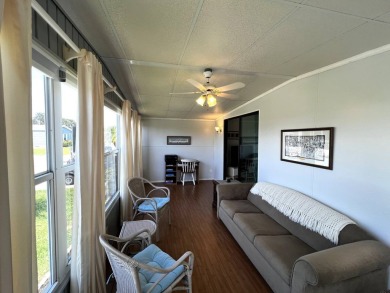 Welcome to your dream oasis! This stunning 2-bedroom, 2-bathroom on Lake Henry Golf Club in Florida - for sale on GolfHomes.com, golf home, golf lot