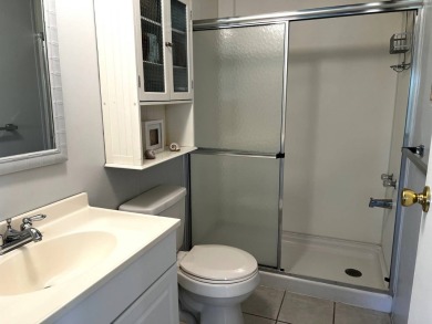 Welcome to your dream oasis! This stunning 2-bedroom, 2-bathroom on Lake Henry Golf Club in Florida - for sale on GolfHomes.com, golf home, golf lot