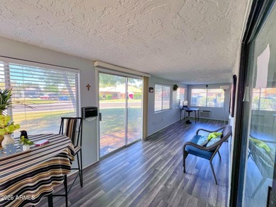 This STUNNING, updated 3BR/2BA + AZ room home is now available on Leisure World Country Club in Arizona - for sale on GolfHomes.com, golf home, golf lot