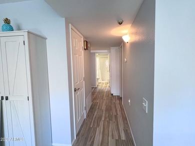 This STUNNING, updated 3BR/2BA + AZ room home is now available on Leisure World Country Club in Arizona - for sale on GolfHomes.com, golf home, golf lot