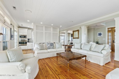 This exceptional oceanfront home in Roosevelt Beach showcases on The Country Club of the Crystal Coast in North Carolina - for sale on GolfHomes.com, golf home, golf lot