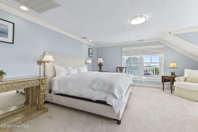This exceptional oceanfront home in Roosevelt Beach showcases on The Country Club of the Crystal Coast in North Carolina - for sale on GolfHomes.com, golf home, golf lot
