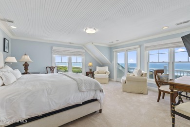 This exceptional oceanfront home in Roosevelt Beach showcases on The Country Club of the Crystal Coast in North Carolina - for sale on GolfHomes.com, golf home, golf lot