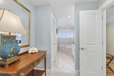 This exceptional oceanfront home in Roosevelt Beach showcases on The Country Club of the Crystal Coast in North Carolina - for sale on GolfHomes.com, golf home, golf lot