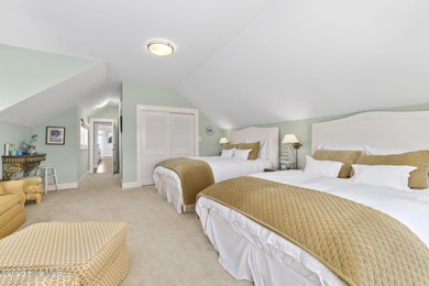 This exceptional oceanfront home in Roosevelt Beach showcases on The Country Club of the Crystal Coast in North Carolina - for sale on GolfHomes.com, golf home, golf lot