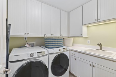 This exceptional oceanfront home in Roosevelt Beach showcases on The Country Club of the Crystal Coast in North Carolina - for sale on GolfHomes.com, golf home, golf lot