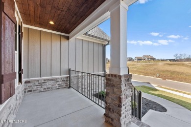 This beautifully designed showcase home nestled within the on Tennessee National Golf Club in Tennessee - for sale on GolfHomes.com, golf home, golf lot