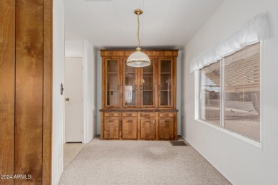 Welcome to this move-in-ready, well-maintained double-wide on Fountain of the Sun Country Club in Arizona - for sale on GolfHomes.com, golf home, golf lot