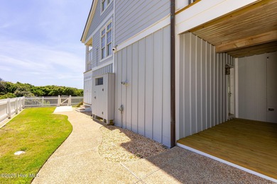 This exceptional oceanfront home in Roosevelt Beach showcases on The Country Club of the Crystal Coast in North Carolina - for sale on GolfHomes.com, golf home, golf lot