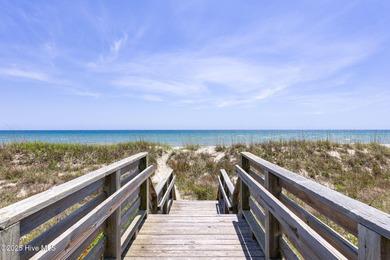This exceptional oceanfront home in Roosevelt Beach showcases on The Country Club of the Crystal Coast in North Carolina - for sale on GolfHomes.com, golf home, golf lot