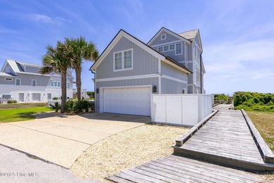 This exceptional oceanfront home in Roosevelt Beach showcases on The Country Club of the Crystal Coast in North Carolina - for sale on GolfHomes.com, golf home, golf lot