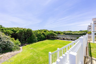 This exceptional oceanfront home in Roosevelt Beach showcases on The Country Club of the Crystal Coast in North Carolina - for sale on GolfHomes.com, golf home, golf lot
