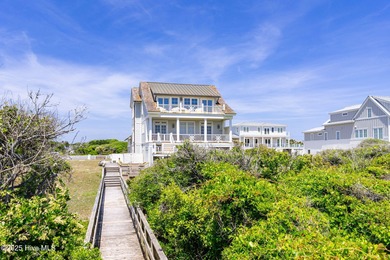 This exceptional oceanfront home in Roosevelt Beach showcases on The Country Club of the Crystal Coast in North Carolina - for sale on GolfHomes.com, golf home, golf lot