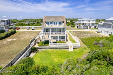 This exceptional oceanfront home in Roosevelt Beach showcases on The Country Club of the Crystal Coast in North Carolina - for sale on GolfHomes.com, golf home, golf lot