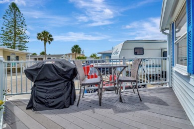 Welcome to The Salty Mermaid, a charming 2-bedroom, 1-bathroom on Island Dunes Country Club in Florida - for sale on GolfHomes.com, golf home, golf lot
