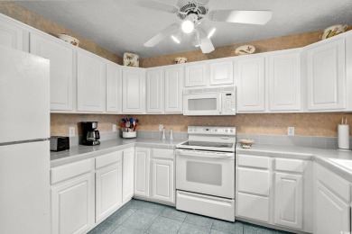 Located in the heart of Pawleys Island, this move-in ready on The Founders Club At Pawleys Island in South Carolina - for sale on GolfHomes.com, golf home, golf lot