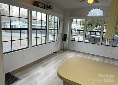 Welcome to your lake getaway at Twin Harbor, whether you are on The Tillery Tradition Country Club in North Carolina - for sale on GolfHomes.com, golf home, golf lot