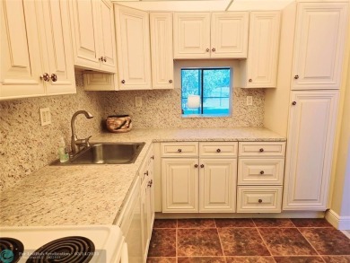 All ages welcome here! Located on the 1st floor, this 1 bedroom on Colony West Country Club in Florida - for sale on GolfHomes.com, golf home, golf lot