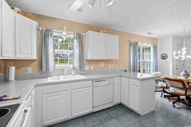 Located in the heart of Pawleys Island, this move-in ready on The Founders Club At Pawleys Island in South Carolina - for sale on GolfHomes.com, golf home, golf lot