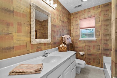 Located in the heart of Pawleys Island, this move-in ready on The Founders Club At Pawleys Island in South Carolina - for sale on GolfHomes.com, golf home, golf lot
