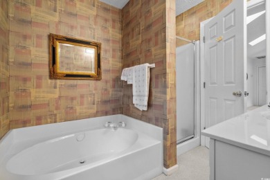 Located in the heart of Pawleys Island, this move-in ready on The Founders Club At Pawleys Island in South Carolina - for sale on GolfHomes.com, golf home, golf lot