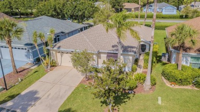An incredibly priced three bedroom, two bath home in the on Tampa Bay Golf and Country Club in Florida - for sale on GolfHomes.com, golf home, golf lot