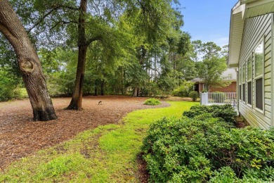 Located in the heart of Pawleys Island, this move-in ready on The Founders Club At Pawleys Island in South Carolina - for sale on GolfHomes.com, golf home, golf lot