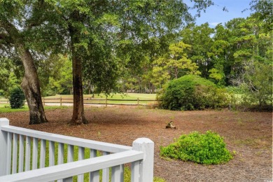 Located in the heart of Pawleys Island, this move-in ready on The Founders Club At Pawleys Island in South Carolina - for sale on GolfHomes.com, golf home, golf lot