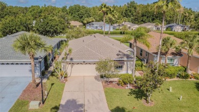 An incredibly priced three bedroom, two bath home in the on Tampa Bay Golf and Country Club in Florida - for sale on GolfHomes.com, golf home, golf lot