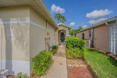 An incredibly priced three bedroom, two bath home in the on Tampa Bay Golf and Country Club in Florida - for sale on GolfHomes.com, golf home, golf lot