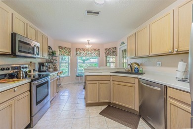 An incredibly priced three bedroom, two bath home in the on Tampa Bay Golf and Country Club in Florida - for sale on GolfHomes.com, golf home, golf lot
