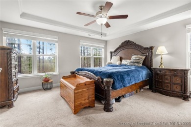 This stunning three-story, four-bedroom, 2.5-bath home in the on Anderson Creek Golf Club in North Carolina - for sale on GolfHomes.com, golf home, golf lot