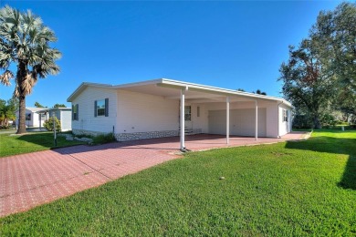 Discover Your Dream Home on Golden Pond: A Perfect Blend of on Polo Park Golf Course in Florida - for sale on GolfHomes.com, golf home, golf lot